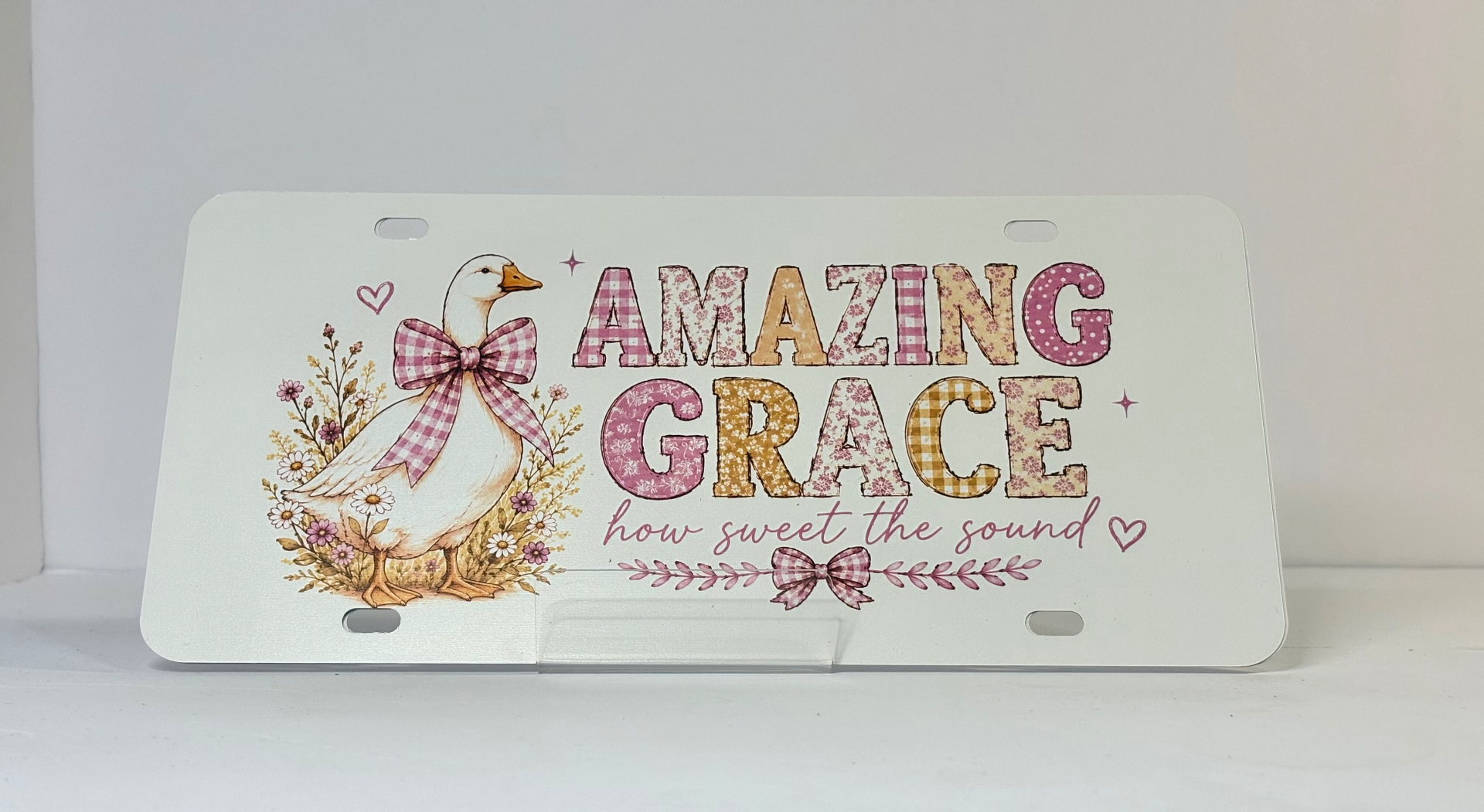 Custom license plate with Amazing Grace goose design